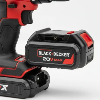 A Black and Decker 20V Max battery being inserted into a power tool, showing system compatibility